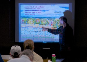 Nico Hauwert demonstrating basic aquifer concepts. Photo by Marc Opperman